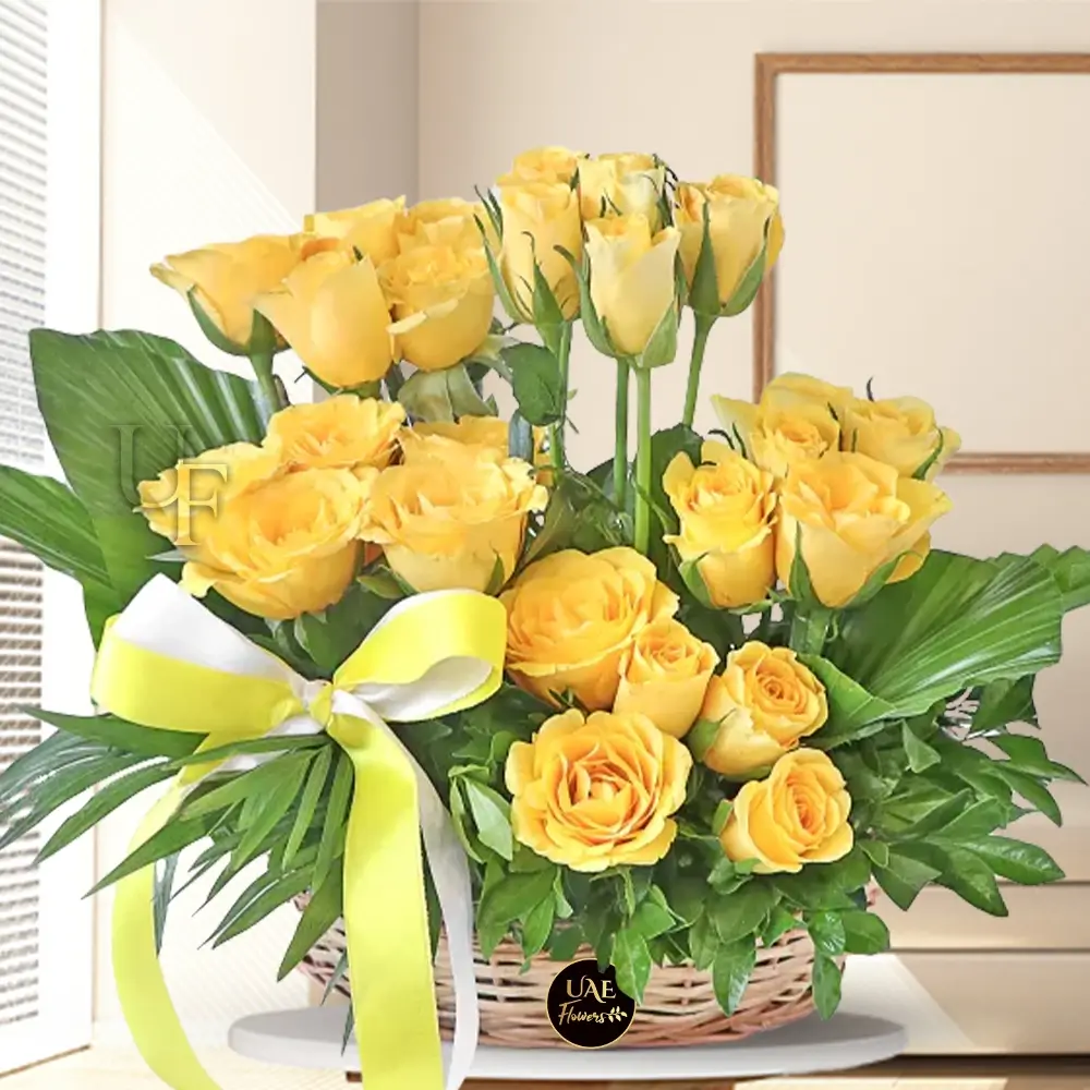 18 yellow roses arranged in a basket