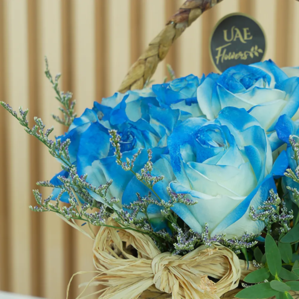 Basket of 10 blue roses with fillers