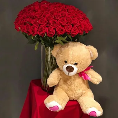 100 red roses in a glass vase & medium size teddy bear