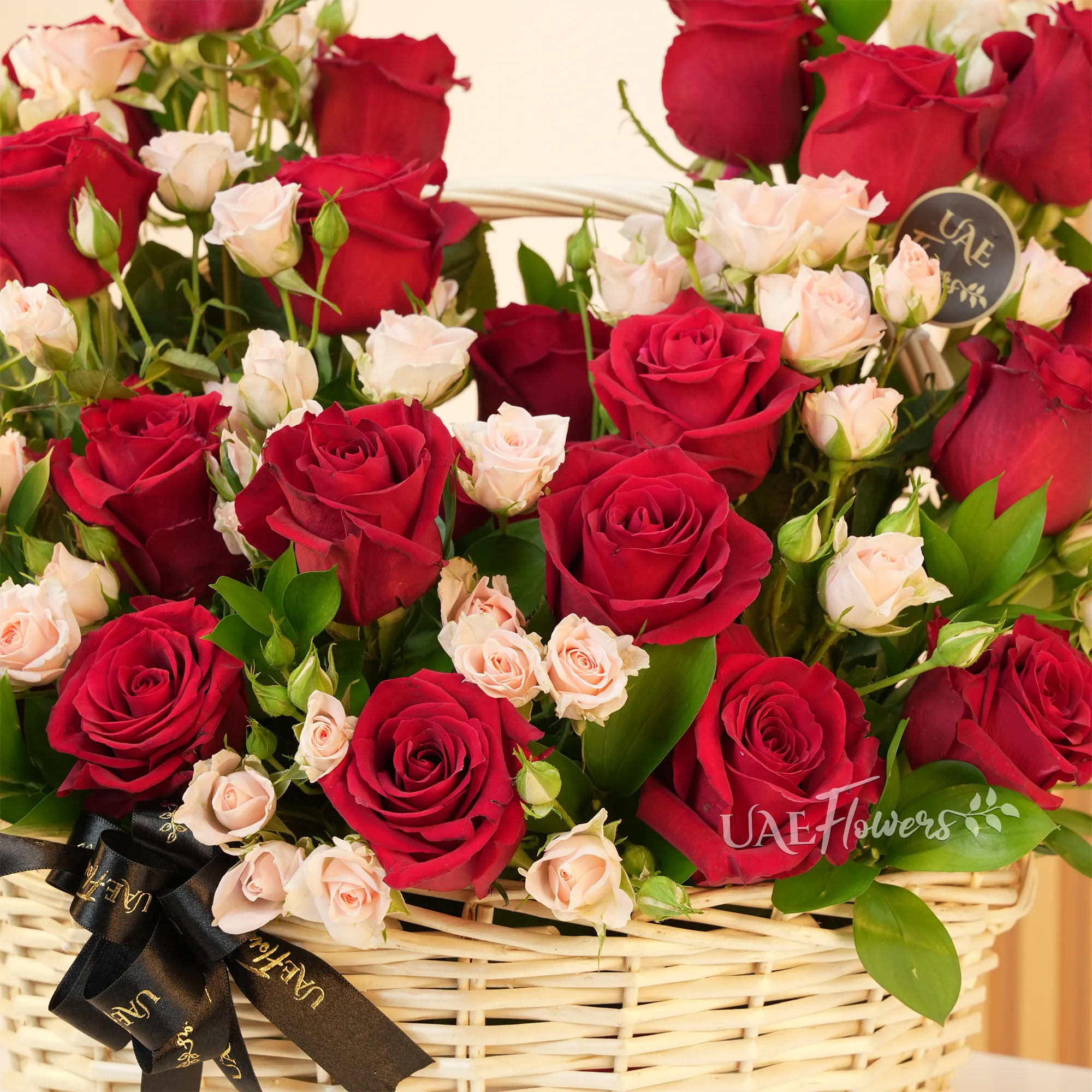 20 red roses, 6 pink spray roses, and green fillers