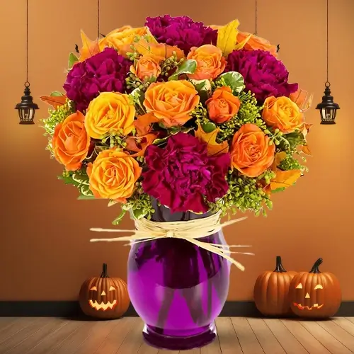 14 orange roses, 6 dark pink carnation, & green fillers in a vase