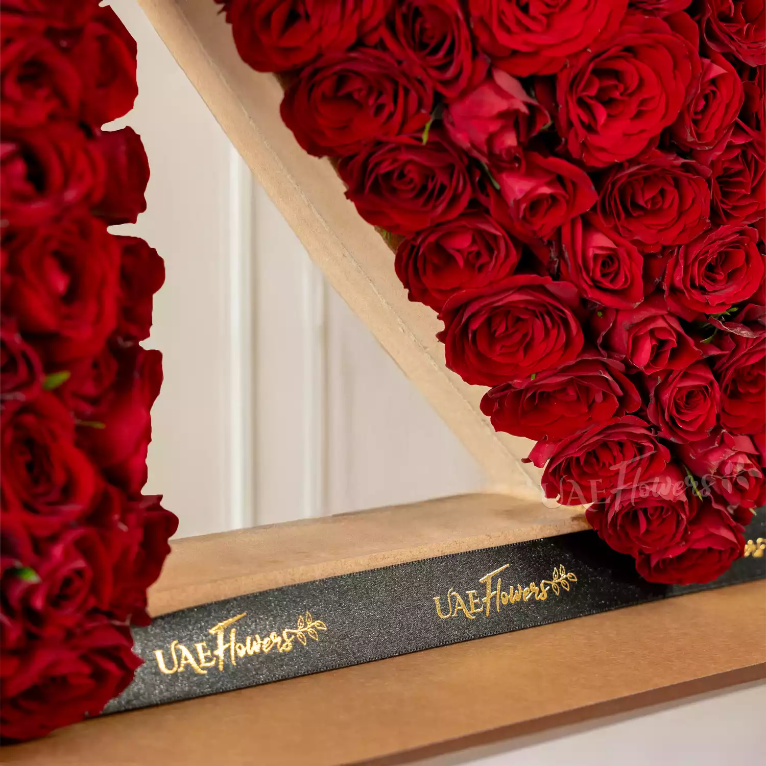350 red spray rose buds arranged in an I Love You shape