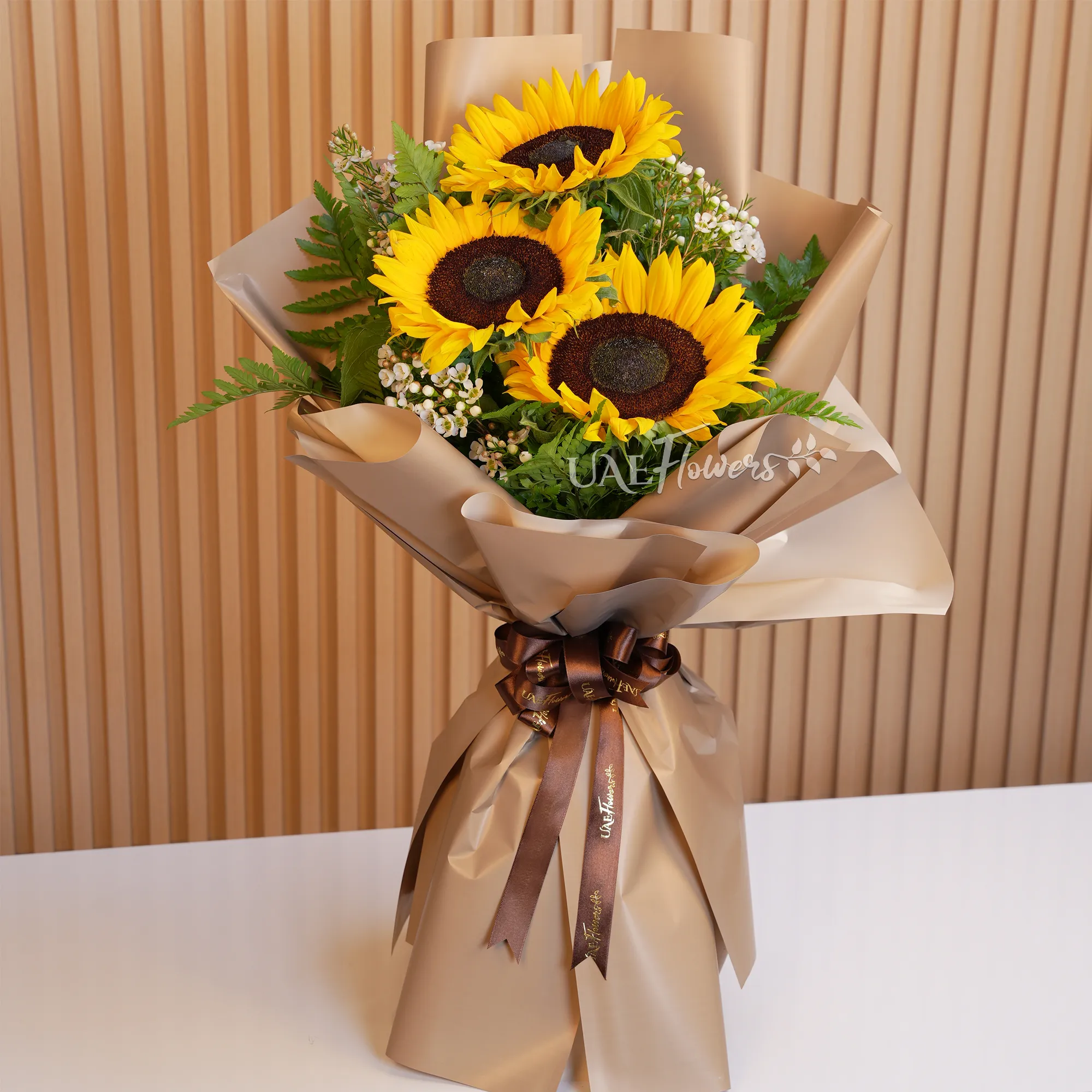 Bouquet of 3 sunflowers with small teddy bear and HAPPY BIRTHDAY foil balloon.