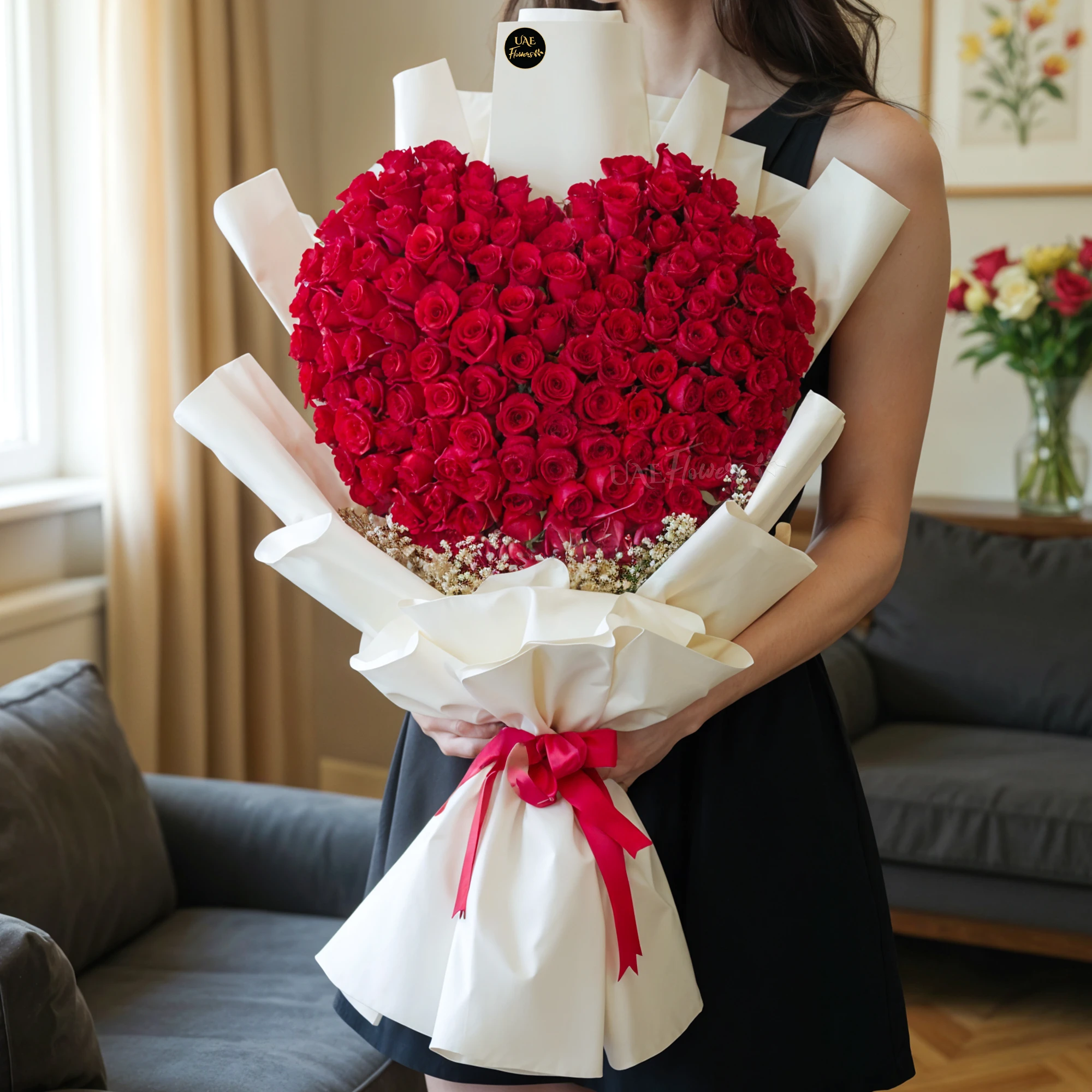 150 red roses with baby’s breath fillers, wrapped in elegant paper