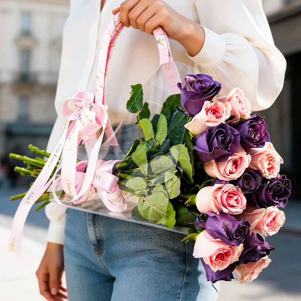 8 Purple and 8 Pink Roses in Acrylic Bag Tied with Pink Ribbons