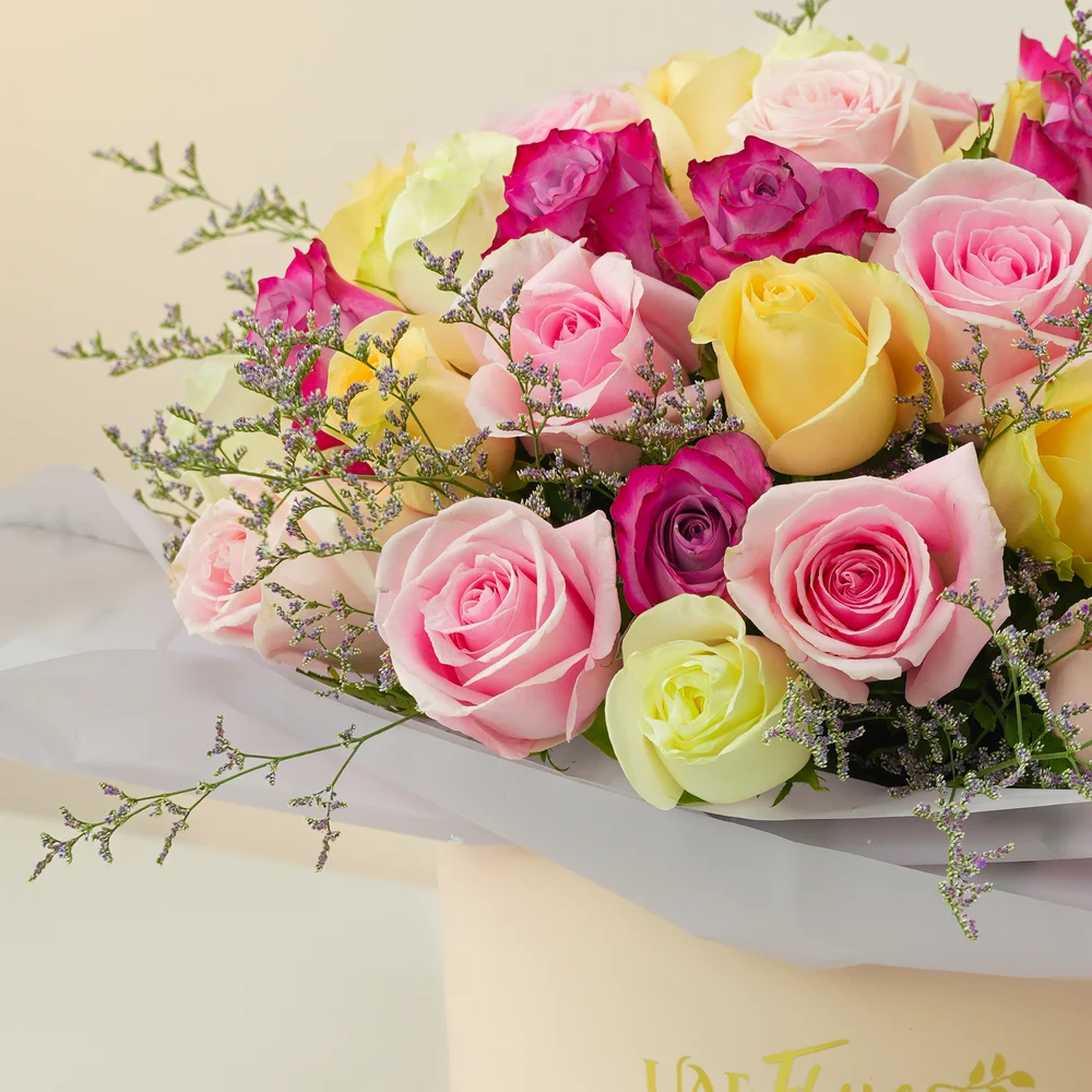 box of 30 roses in purple, pink, peach and white shades