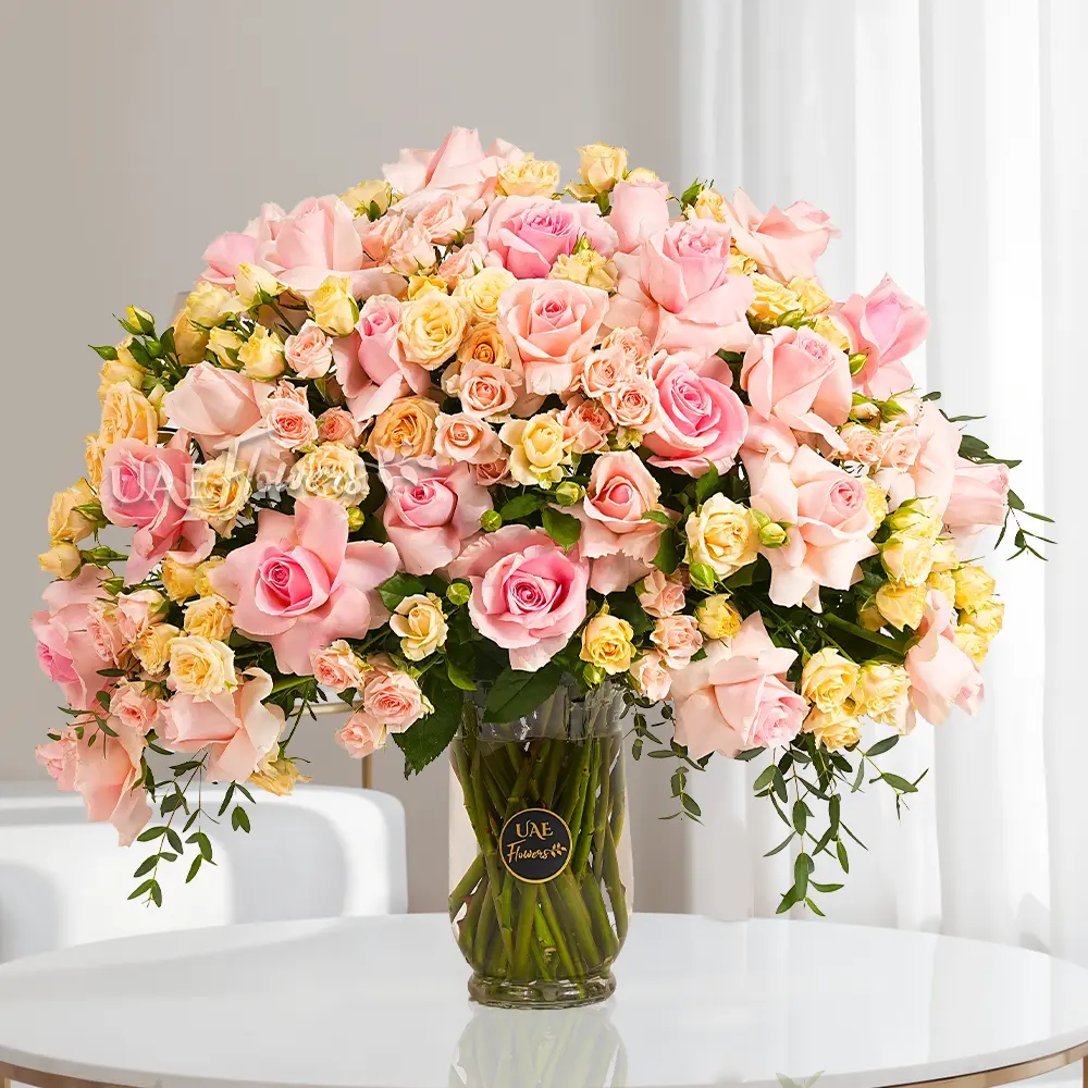 30 pink roses, 15 pink spray roses, and 15 peach spray roses