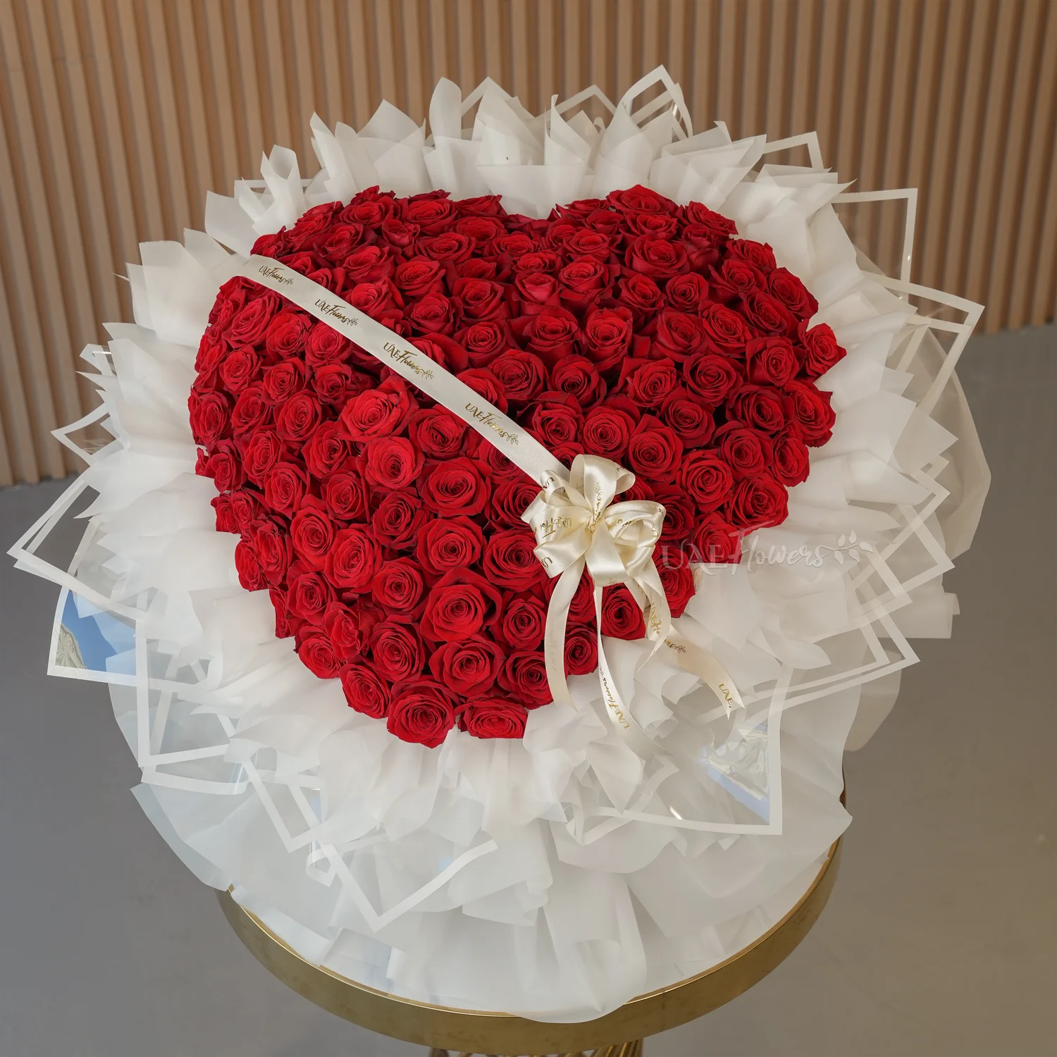 heart-shaped arrangement of 120 red rose